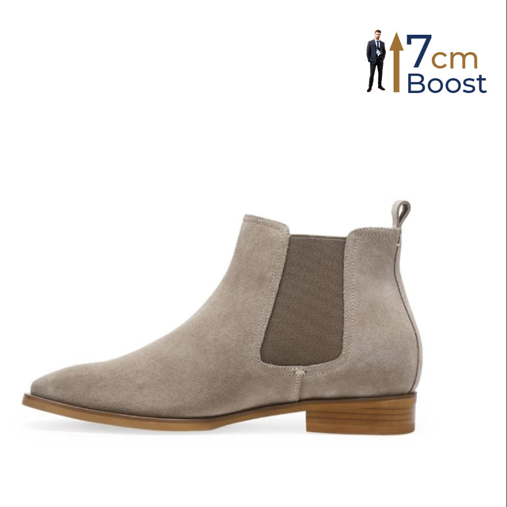 A pair of khaki brown Volo Alte Granada Chelsea elevator boots with a visible heel and lace-up closure.
