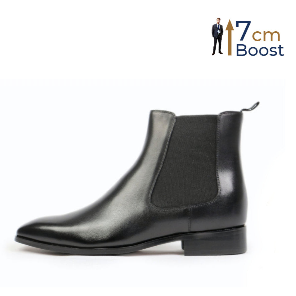 A pair of black Chelsea boots with an invisible height-increasing inner sole, indicating a boost of 7cm.