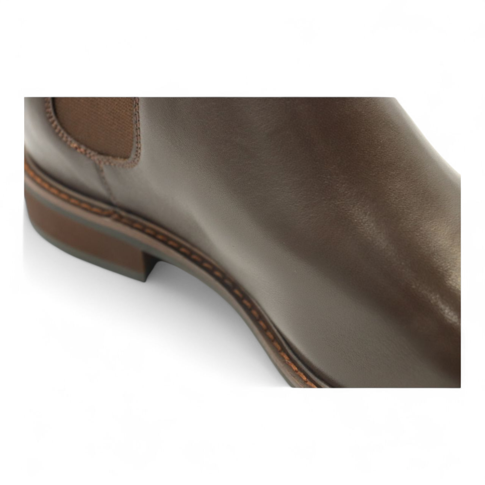 Close-up of a brown leather boot on a white background