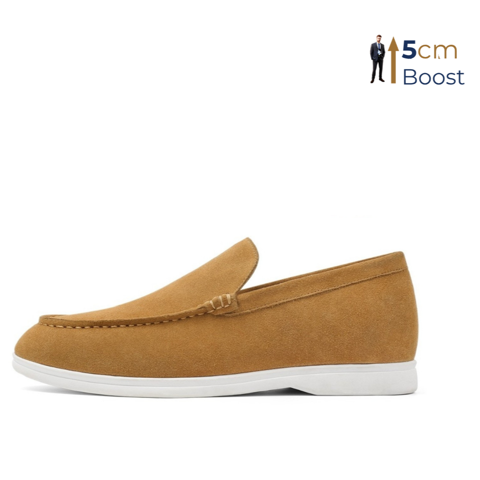 A light brown suede loafer with a white rubber sole and a subtle heel lift, positioned against a white background with a watermark indicating a 5cm boost in height.