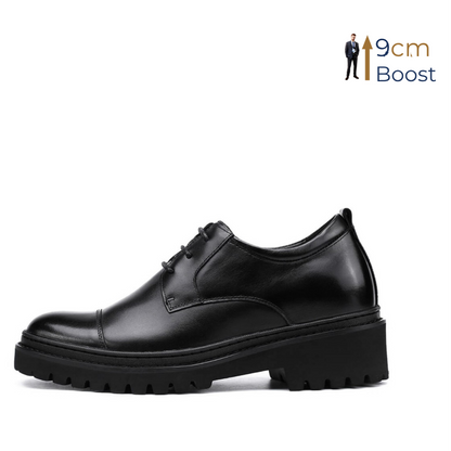 A black leather dress shoe with a 9cm boost in height, featuring a polished finish, minimalist lace-up design, and deep-grooved outsole.